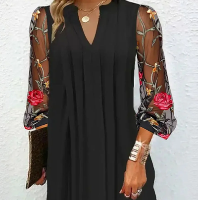 Elegantes Minikleid mit V-Ausschnitt und transparenten Ärmeln
